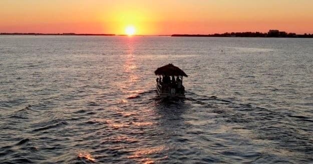 Sunset cruise with floating tiki raft on Florida Keys waters
