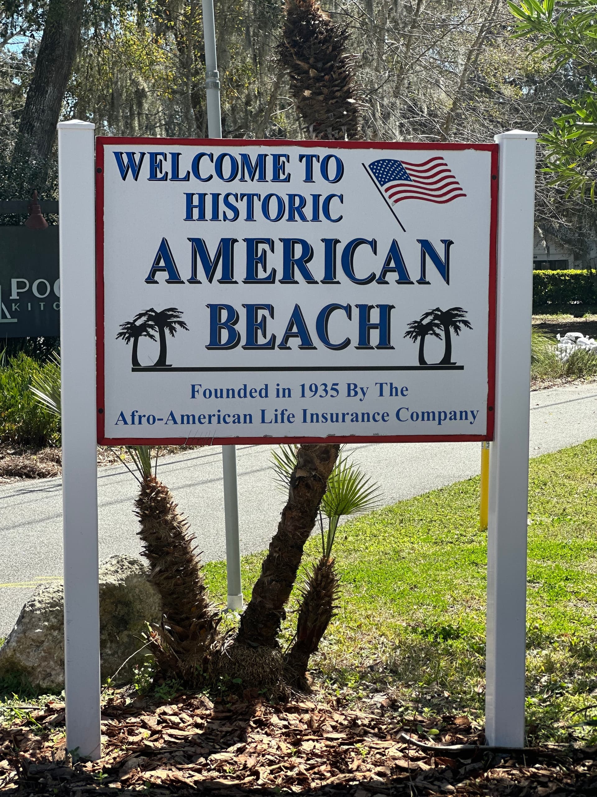Historic American Beach welcome sign at coastal park entrance