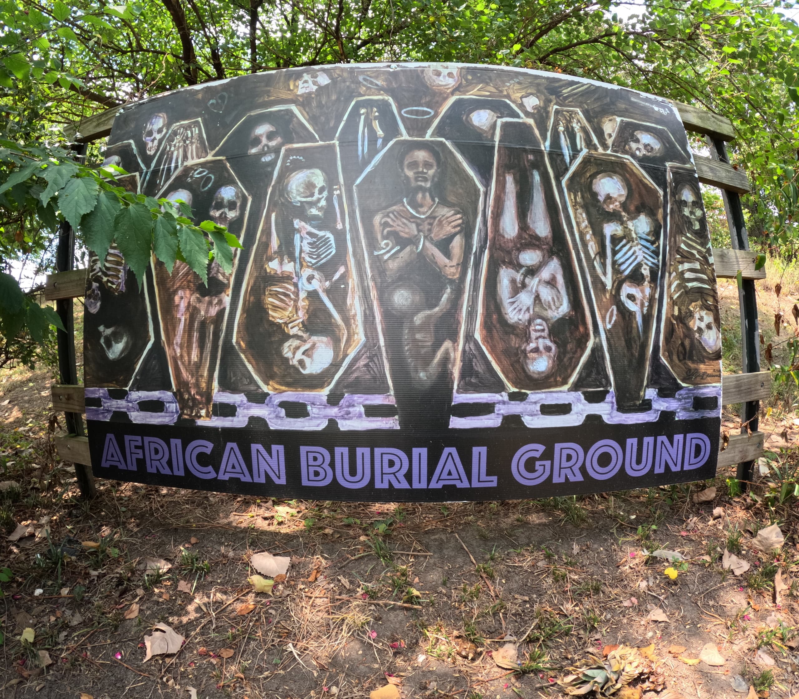 Outdoor African burial ground mural art at historic site