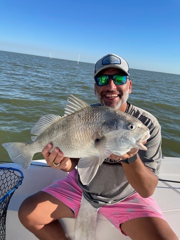 Full-Day Galveston Bay Fishing Charter with Capt. Mark — Trout, Redfish & Pier 6 Lunch