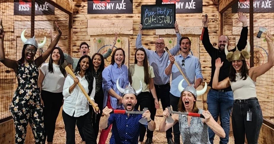 Corporate group celebrating axe throwing team event at KissMyAxe Brookvale