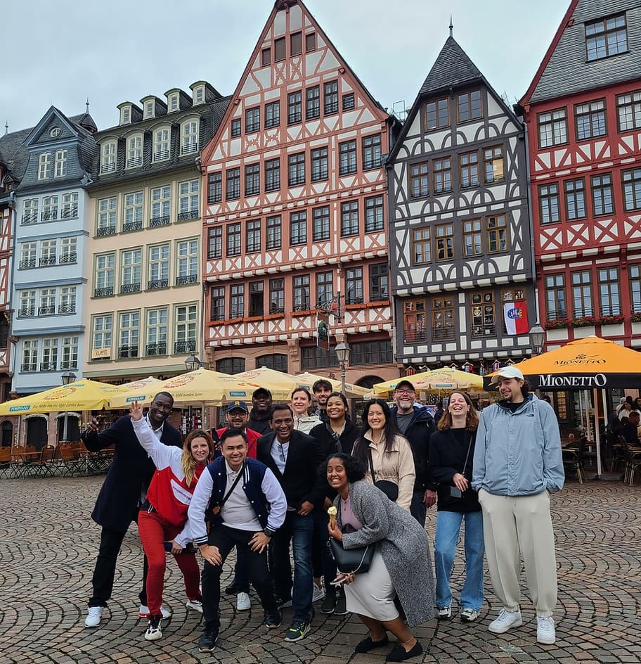 Guided walking tour in historic Frankfurt square with timbered houses