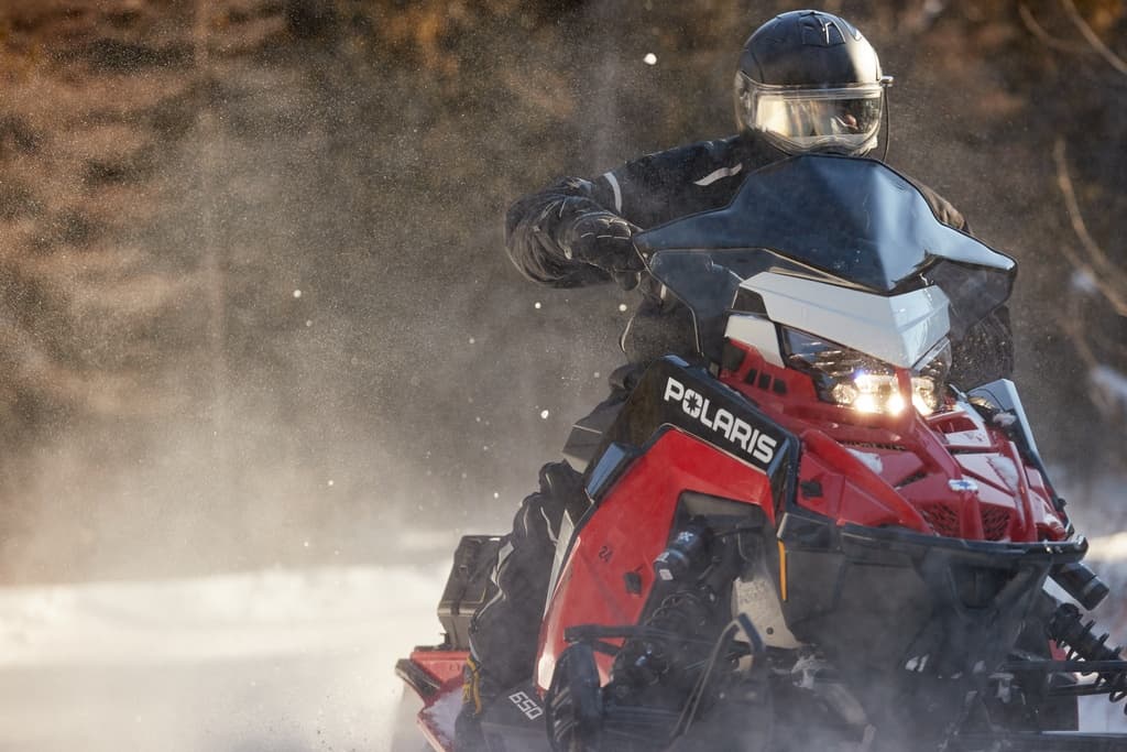 650 Indy Adventure: Multi-Day Polaris Snowmobile Rental in Danbury, WI