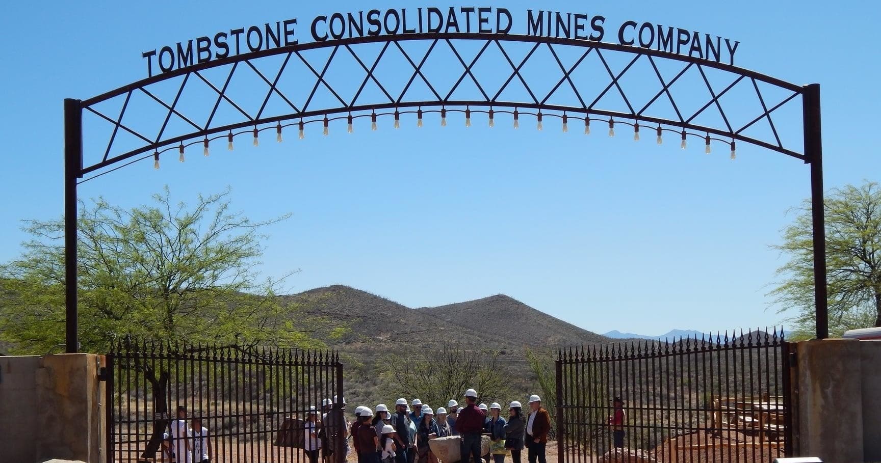 Mine entrance arch at Tombstone silver mine with desert vista