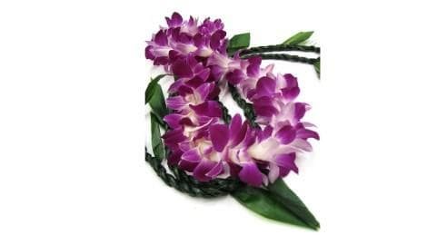 Purple orchid lei on white background for Hawaiian greetings