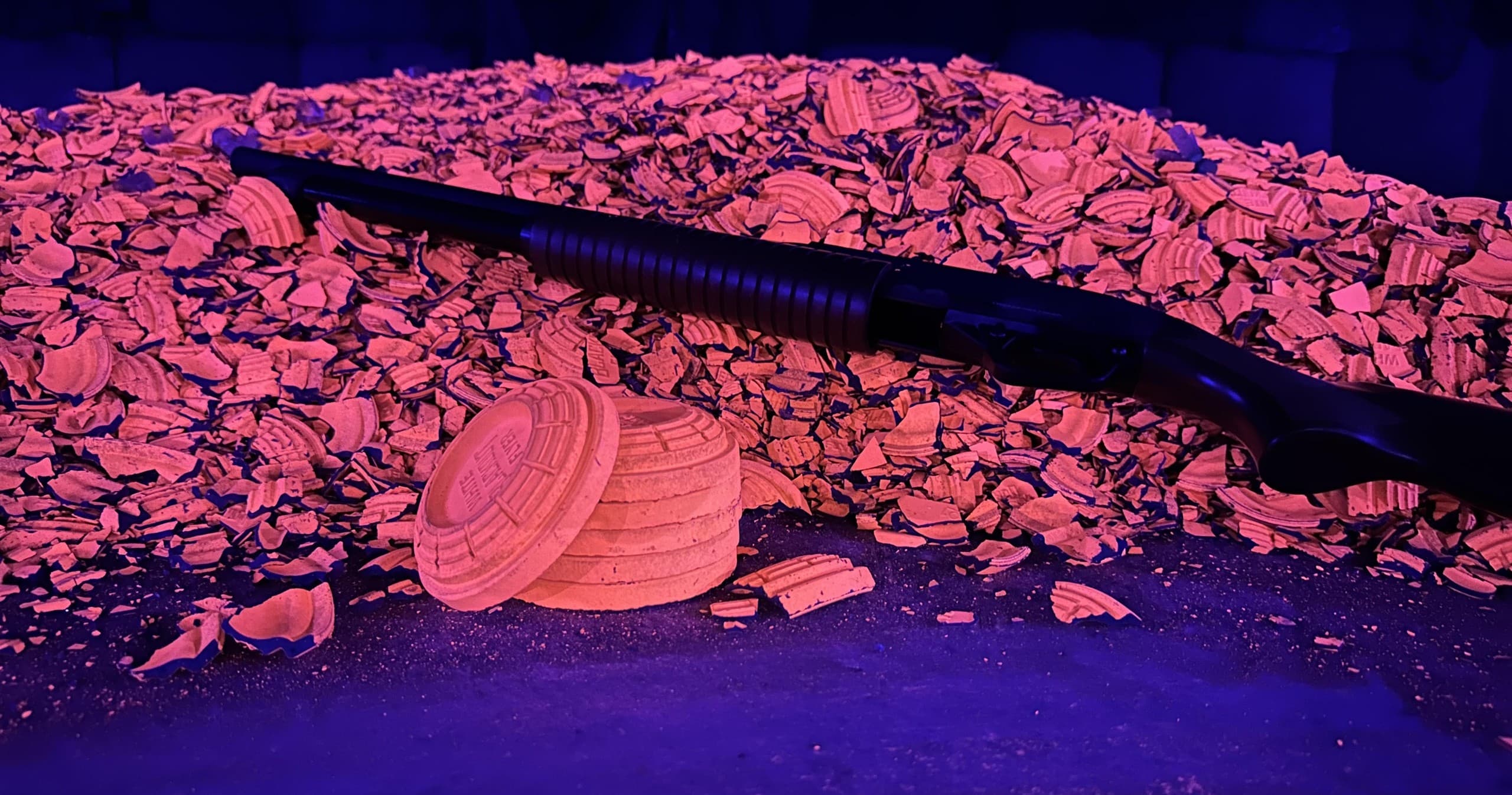 Blacklight Clay Pigeon Range — Indoor Group Shotgun Experience in Murray, Utah