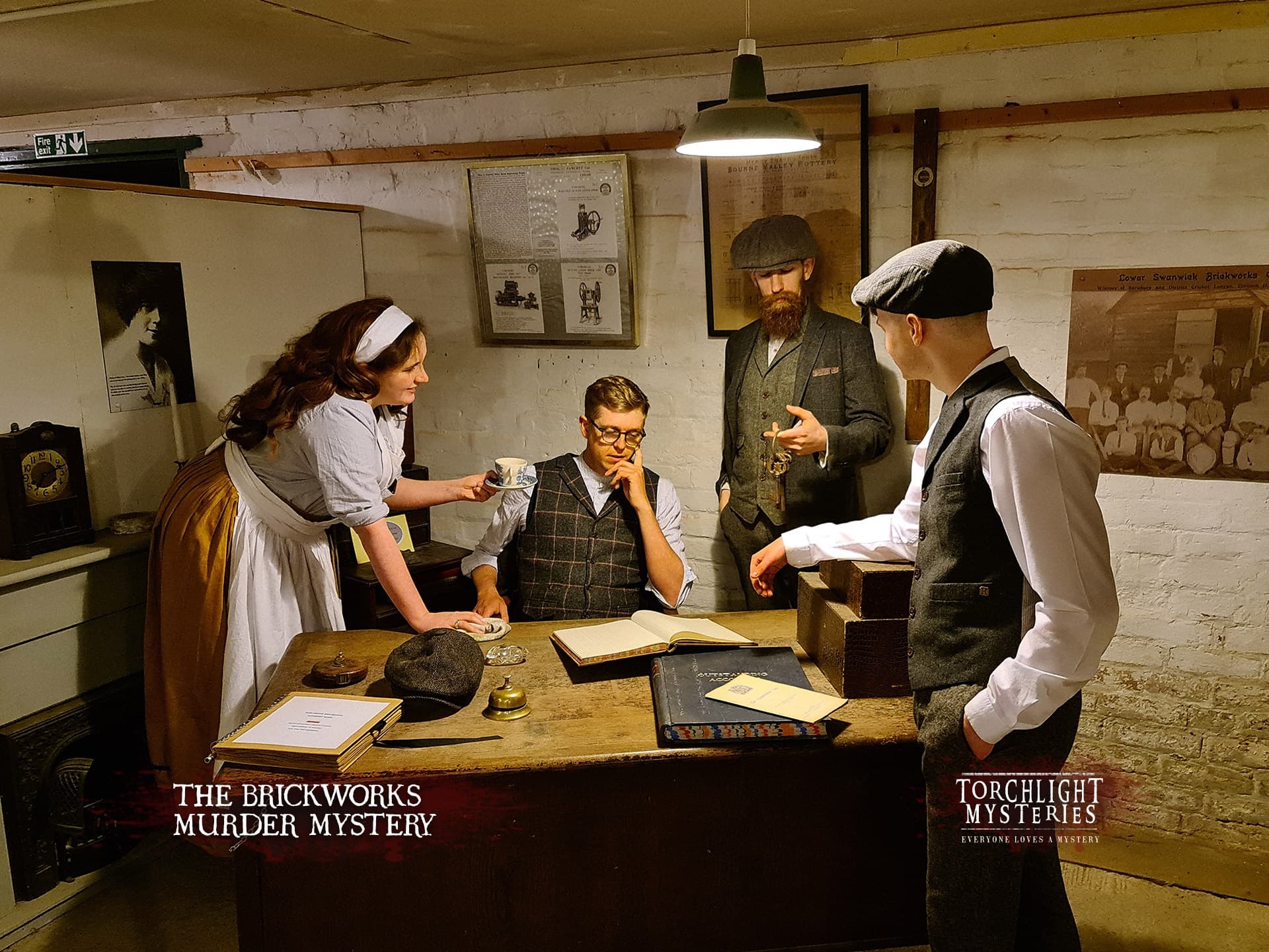Actors solving Brickworks murder mystery in period room, indoor scene