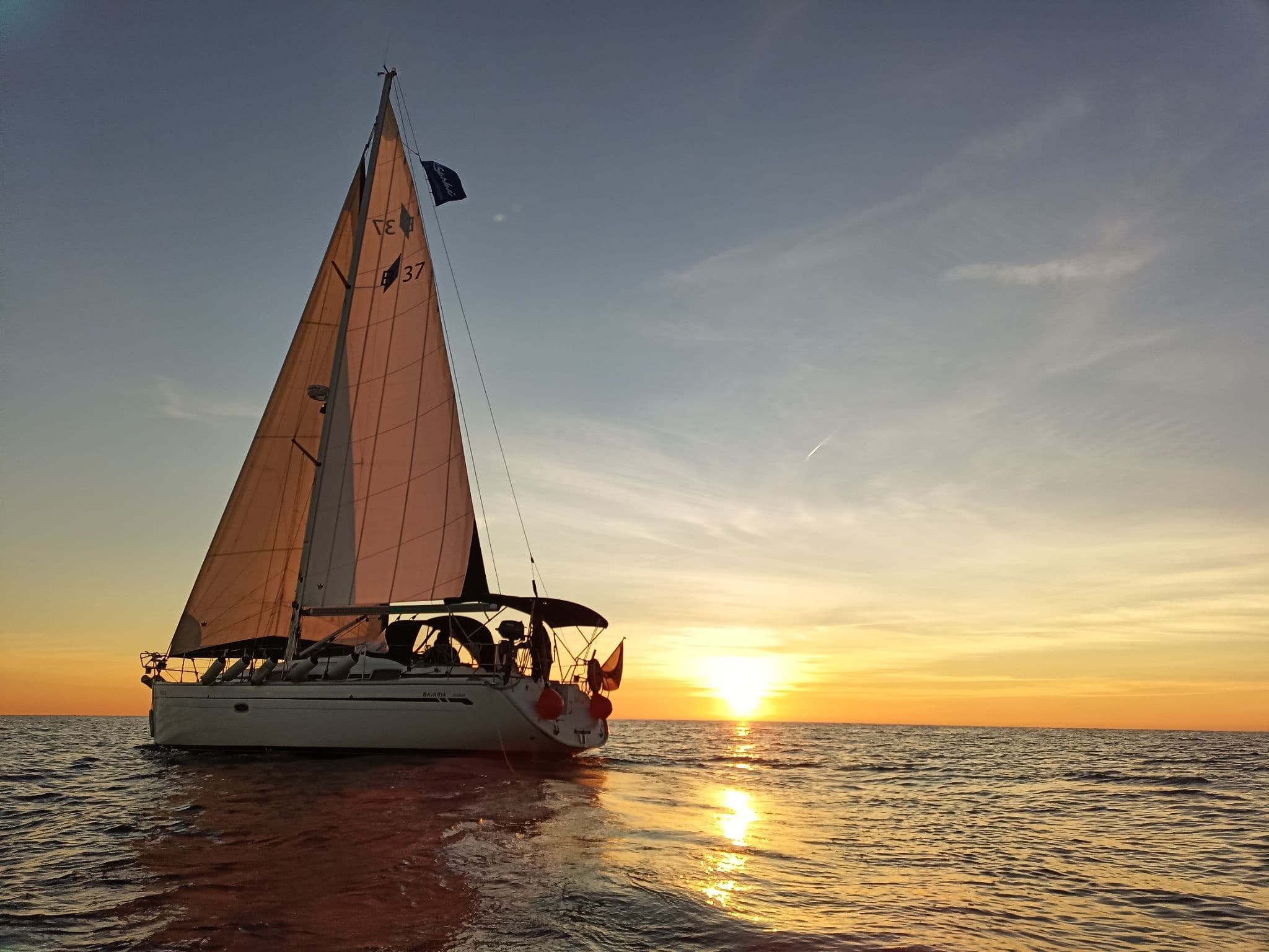 Water Activities: Sunrise Sailing with Sashi