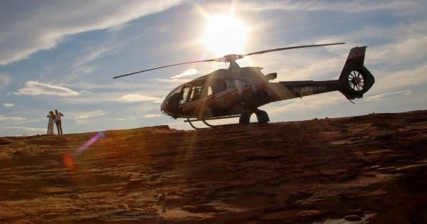 Helicopter flying over Mojave desert at sunset near Las Vegas