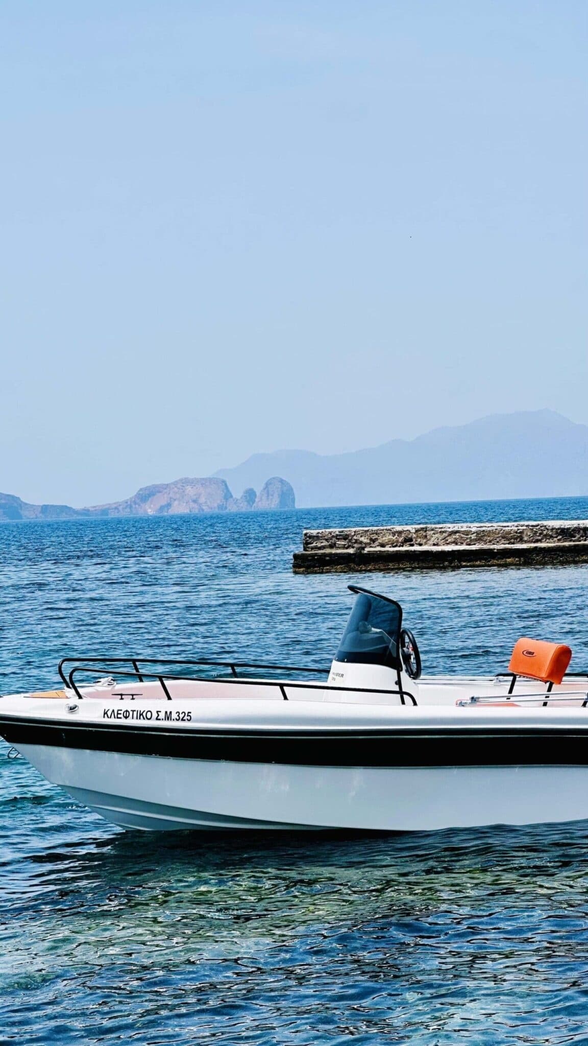 Pilot Your Own Milos Escape: 5-Meter Boat Rental to Secret Caves