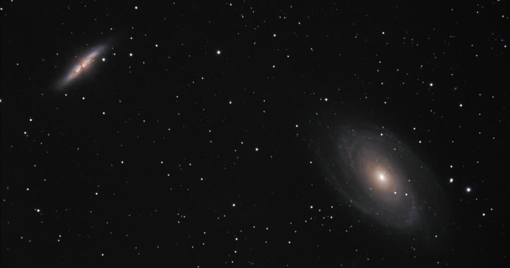 Deep space galaxy photograph showcasing spiral galaxies and stars