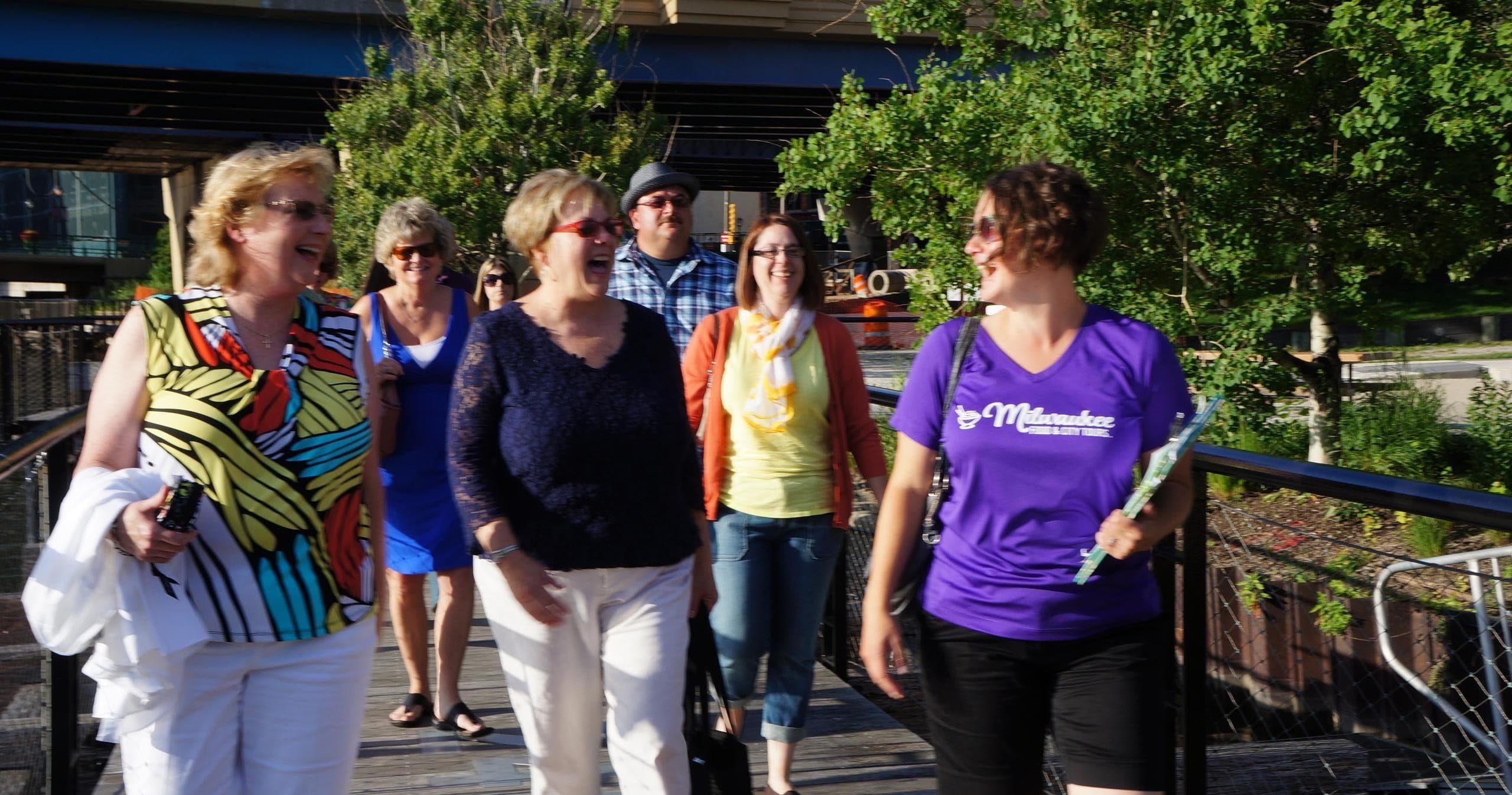 Walking tour group exploring downtown Milwaukee streets