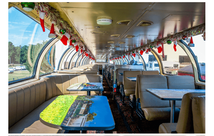 Panoramic dome railcar interior with panoramic windows and views