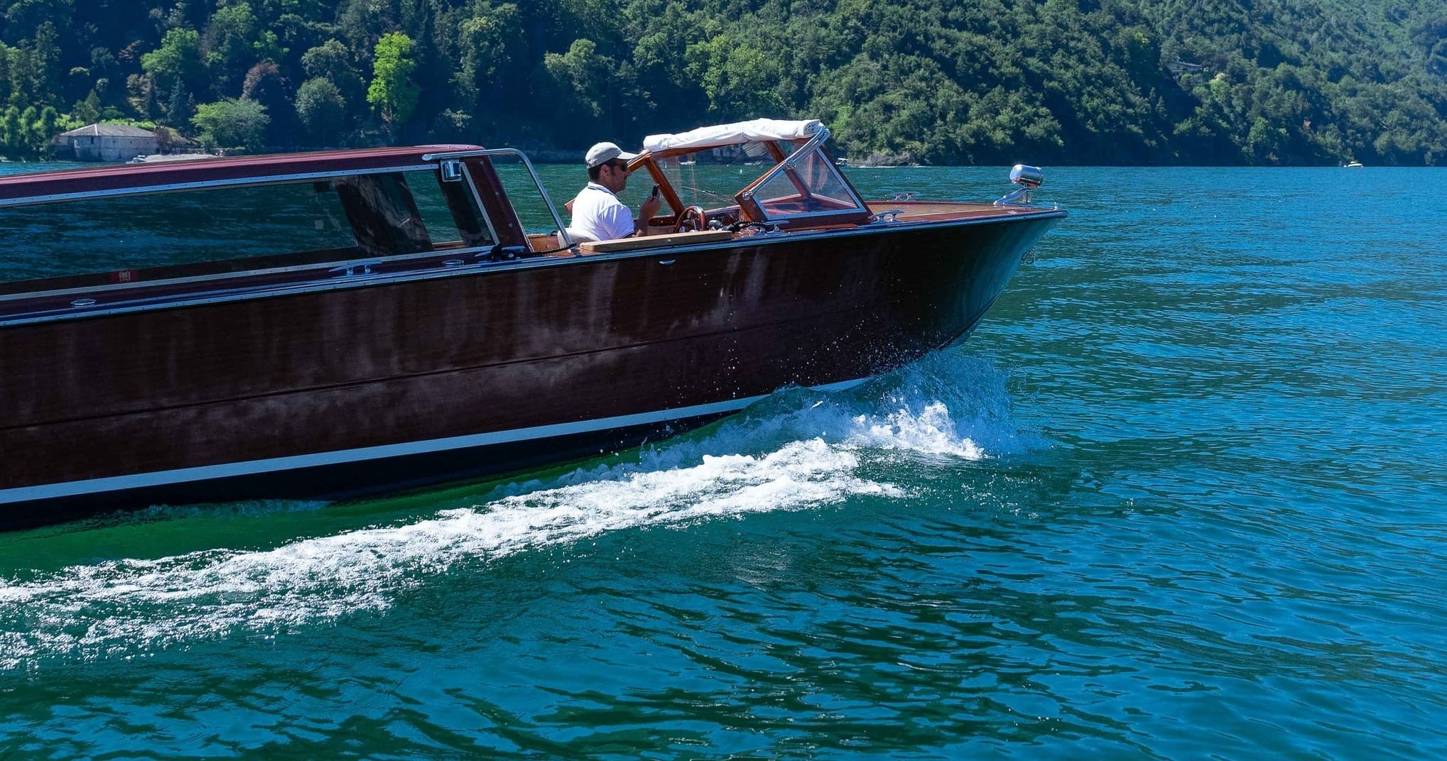 Lake Como Boat Tours with Mostes Classic Boats in Riva photo 1