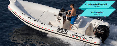 Driver piloting inflatable RIB boat on open coastal waters
