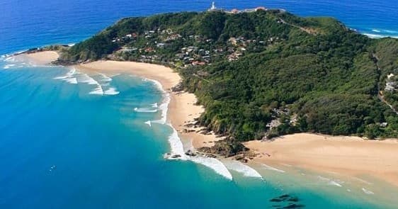Aerial beach and headland at Byron Bay, clear coastal vista