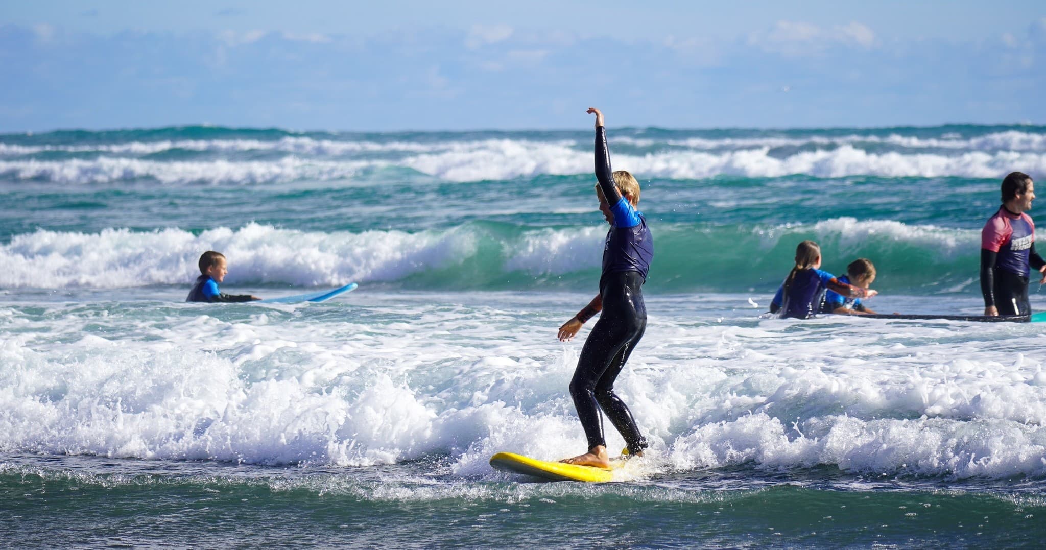 Youth Surf Training at Muriwai Surf School, Auckland