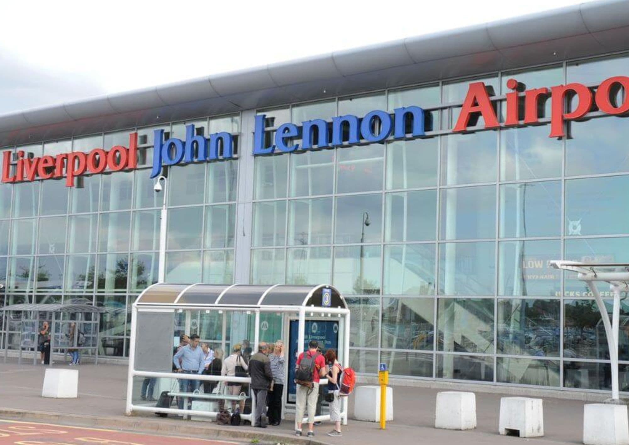 Liverpool John Lennon Airport exterior showing transport access for travelers