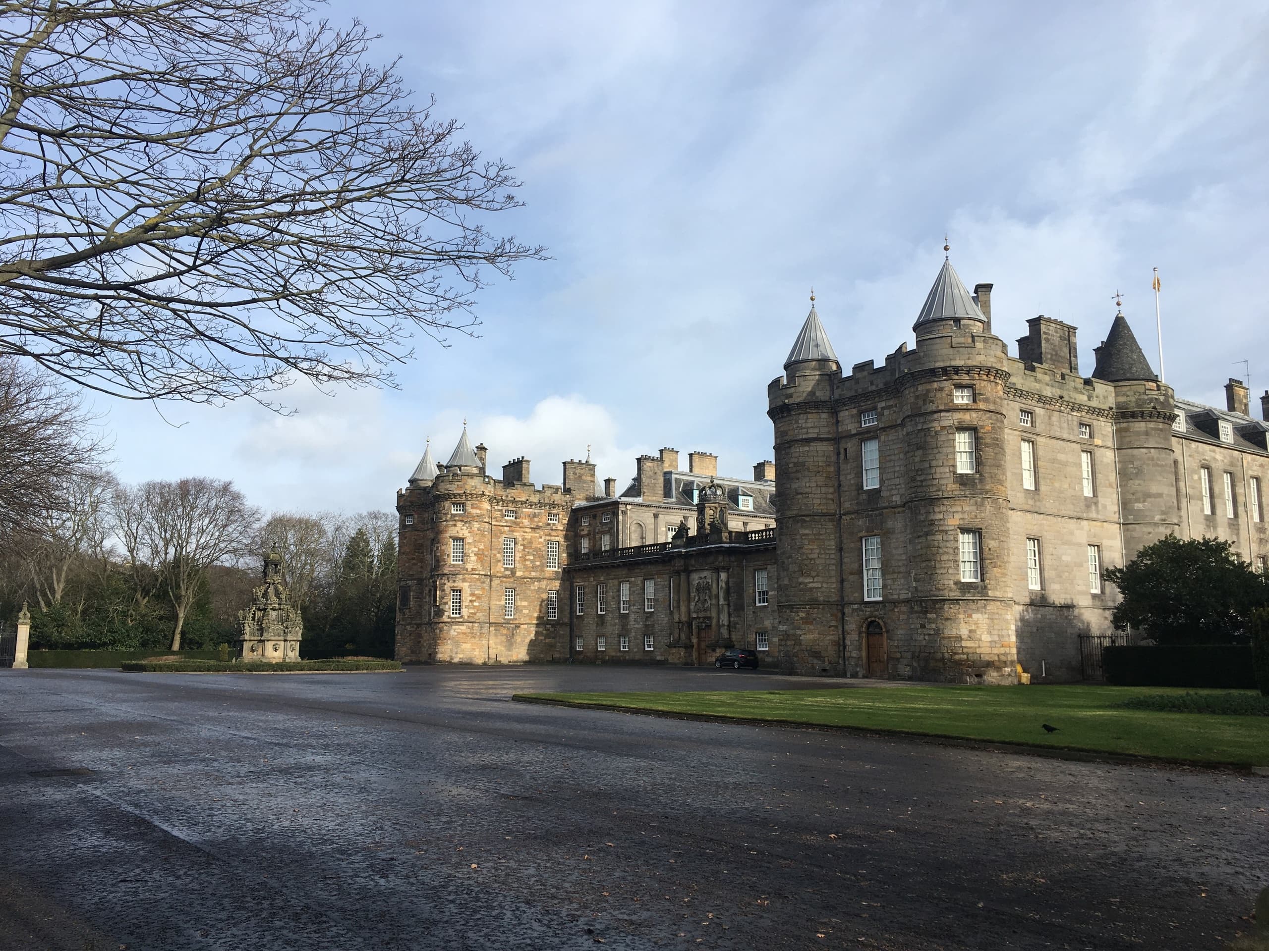 Historic Scottish palace and grounds on estate drive, castle visit