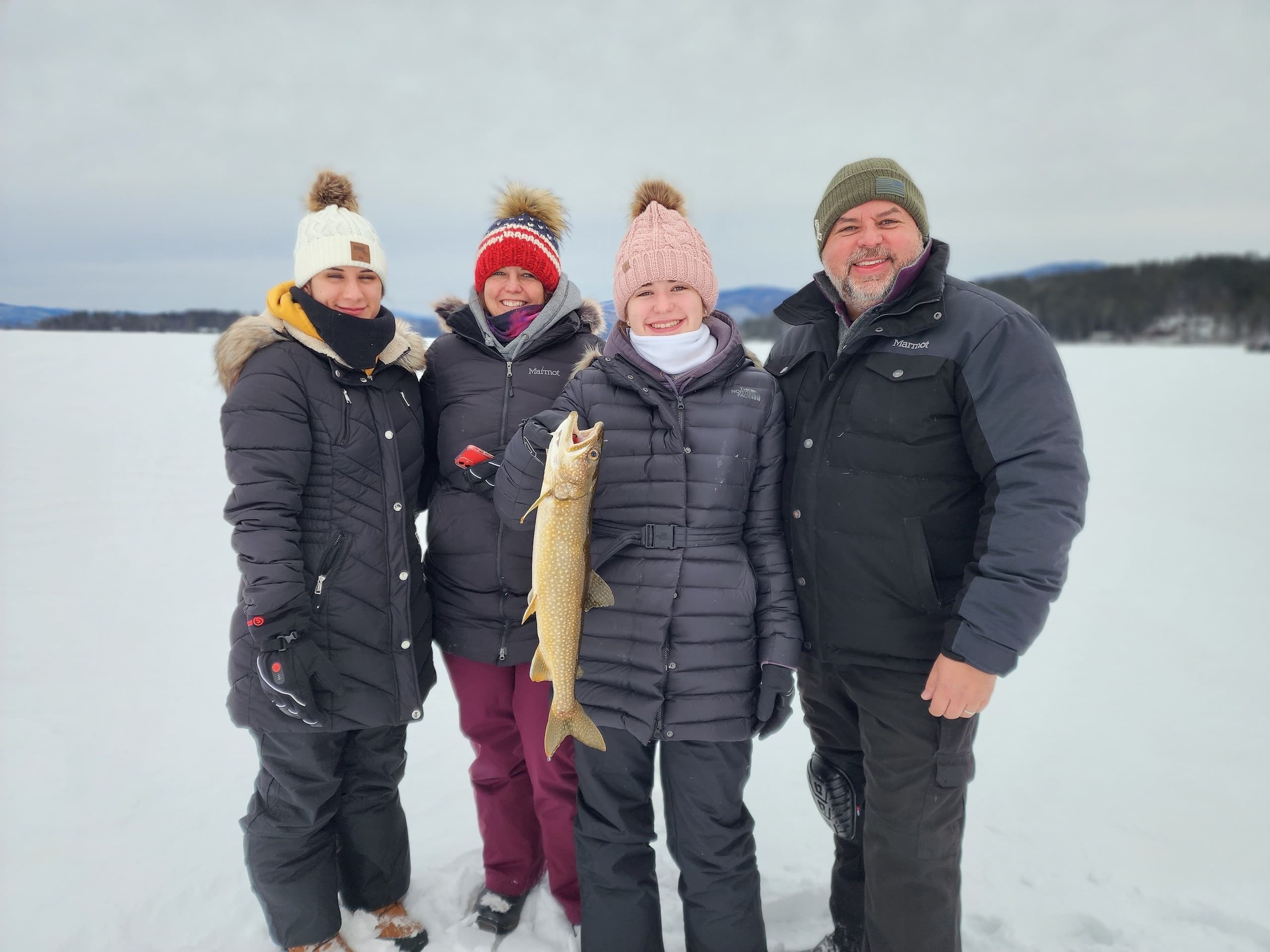 Lake Winnipesaukee Ice Fishing: Heated Fish Houses and Trophy Trout on New Hampshire’s Frozen Lake