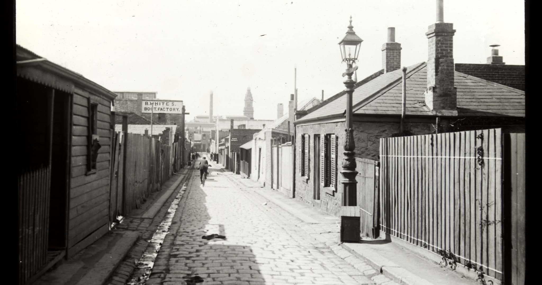 Victorian era laneway with gas lamp in historic Melbourne street