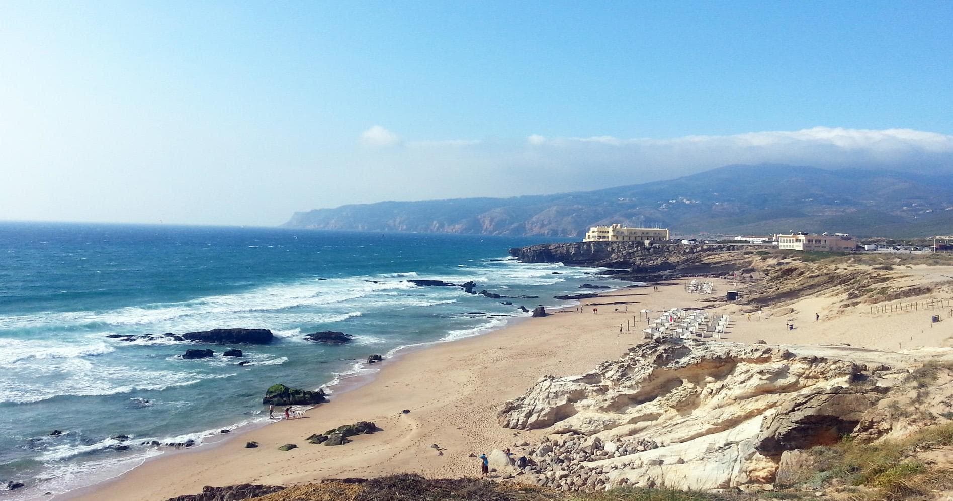 Sandy Atlantic coastline with waves and coastal hiking views