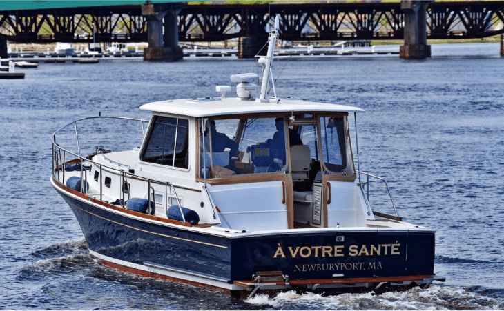 Motor yacht cruising near Newburyport MA, scenic coastal cruise