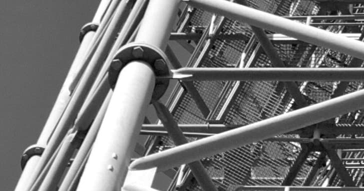 Close-up structural scaffolding detail outdoors on modern tower facade