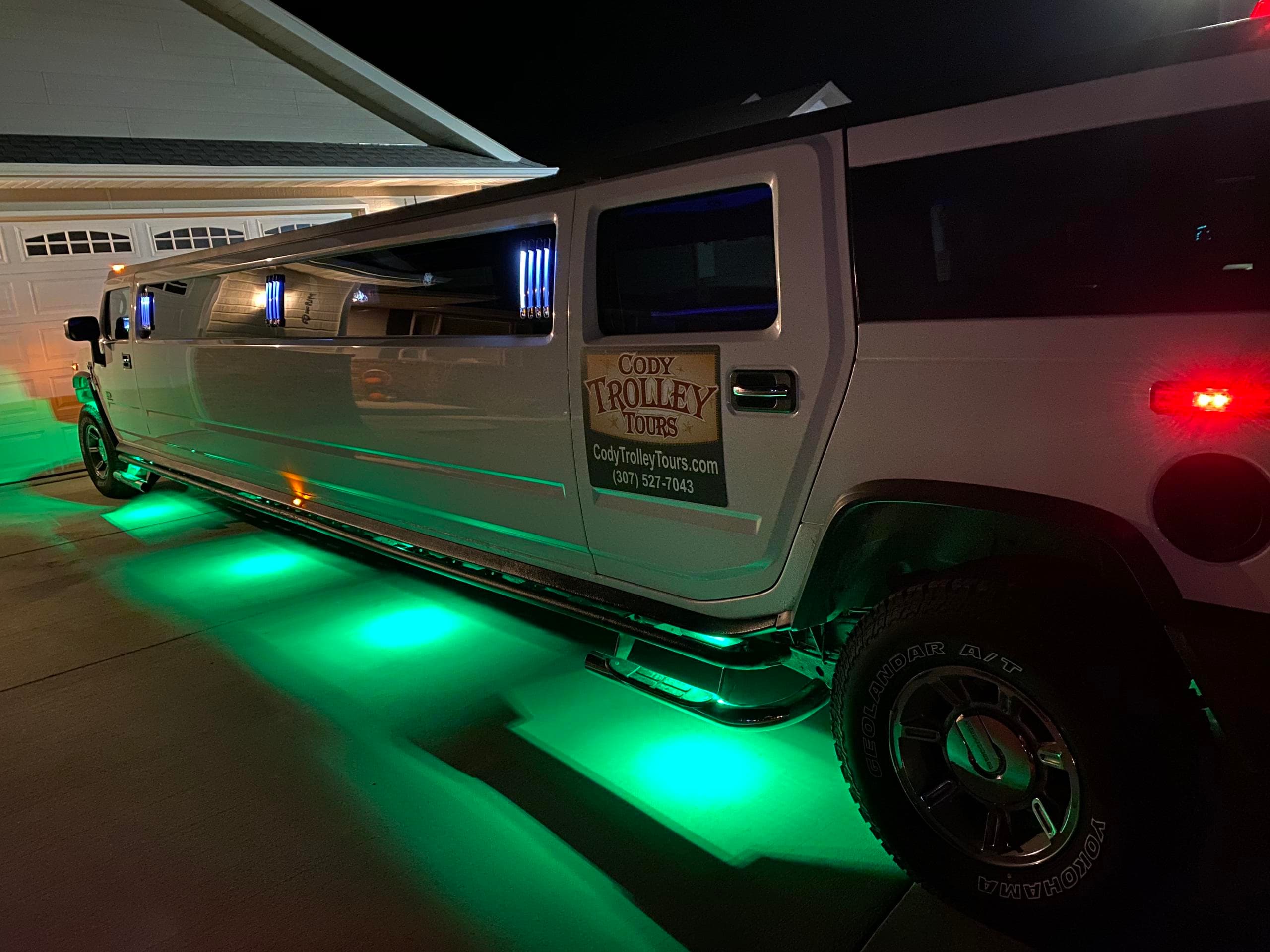 Experience Cody's Festive Magic with a Private Hummer Limo Holiday Lights Tour