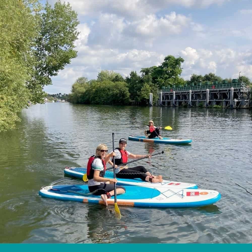 Explore the River Thames with a Group Paddleboard Lesson in West Molesey