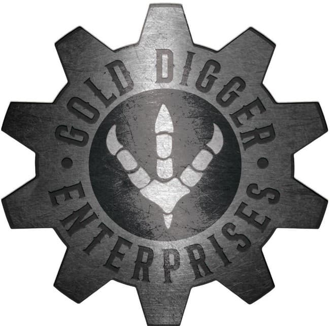 Worn metallic cog emblem featuring dinosaur claw imprint for branding