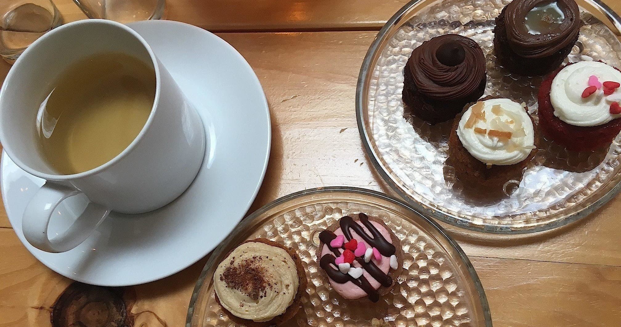 Tea and pastries on rustic table during downtown St. Pete stop