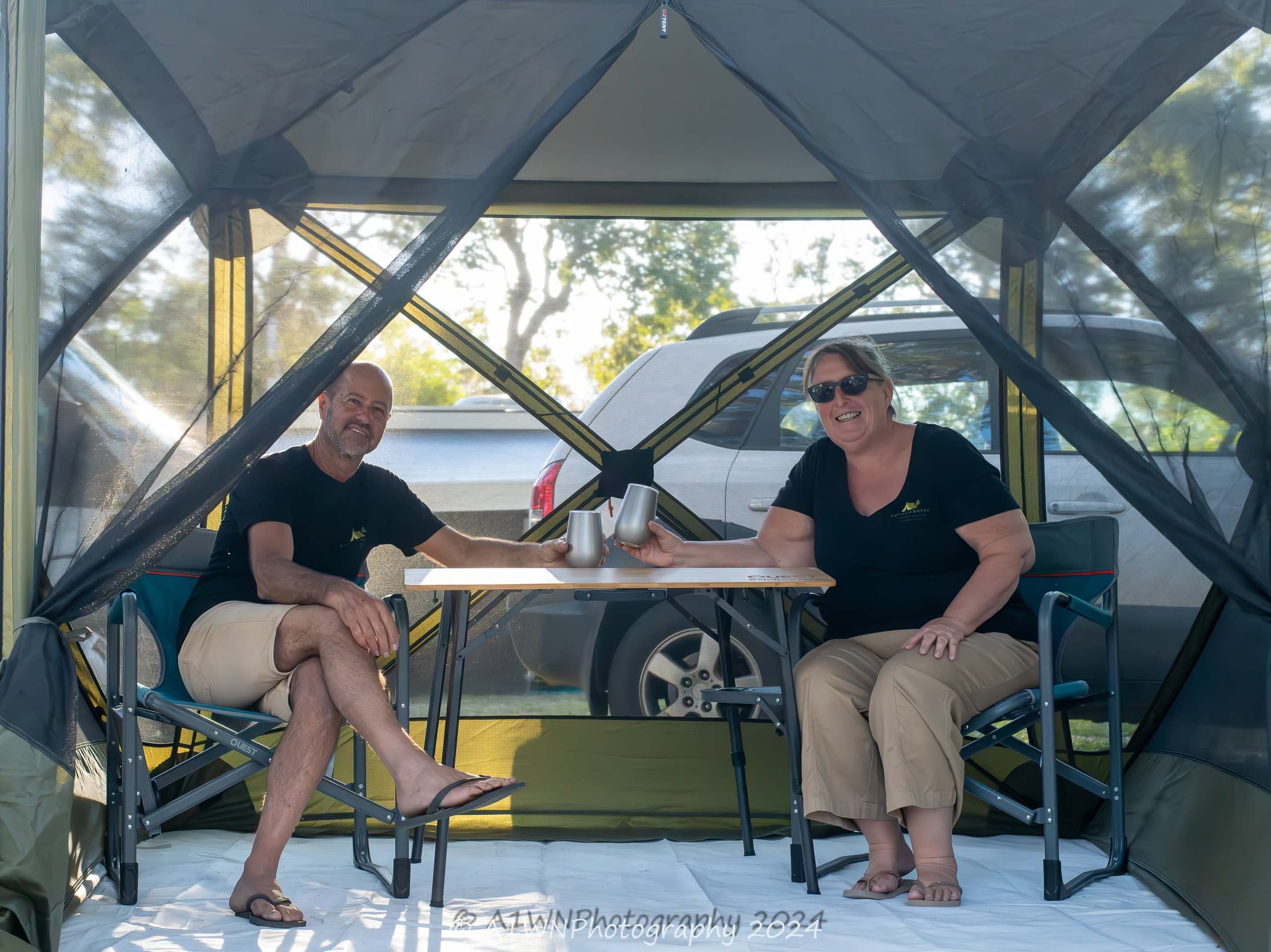 Spacious family campsite with large canvas tent and chairs