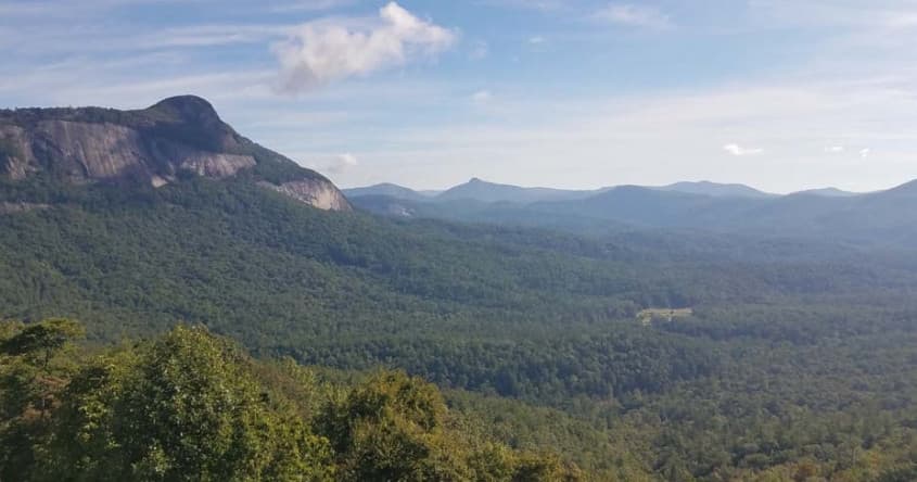 Panoramic mountain vista from overlook highlighting hiking trails