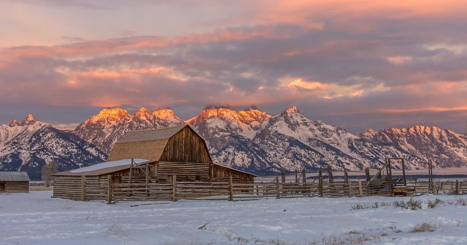 Historic Mormon Row barn with Teton Range sunset backdrop