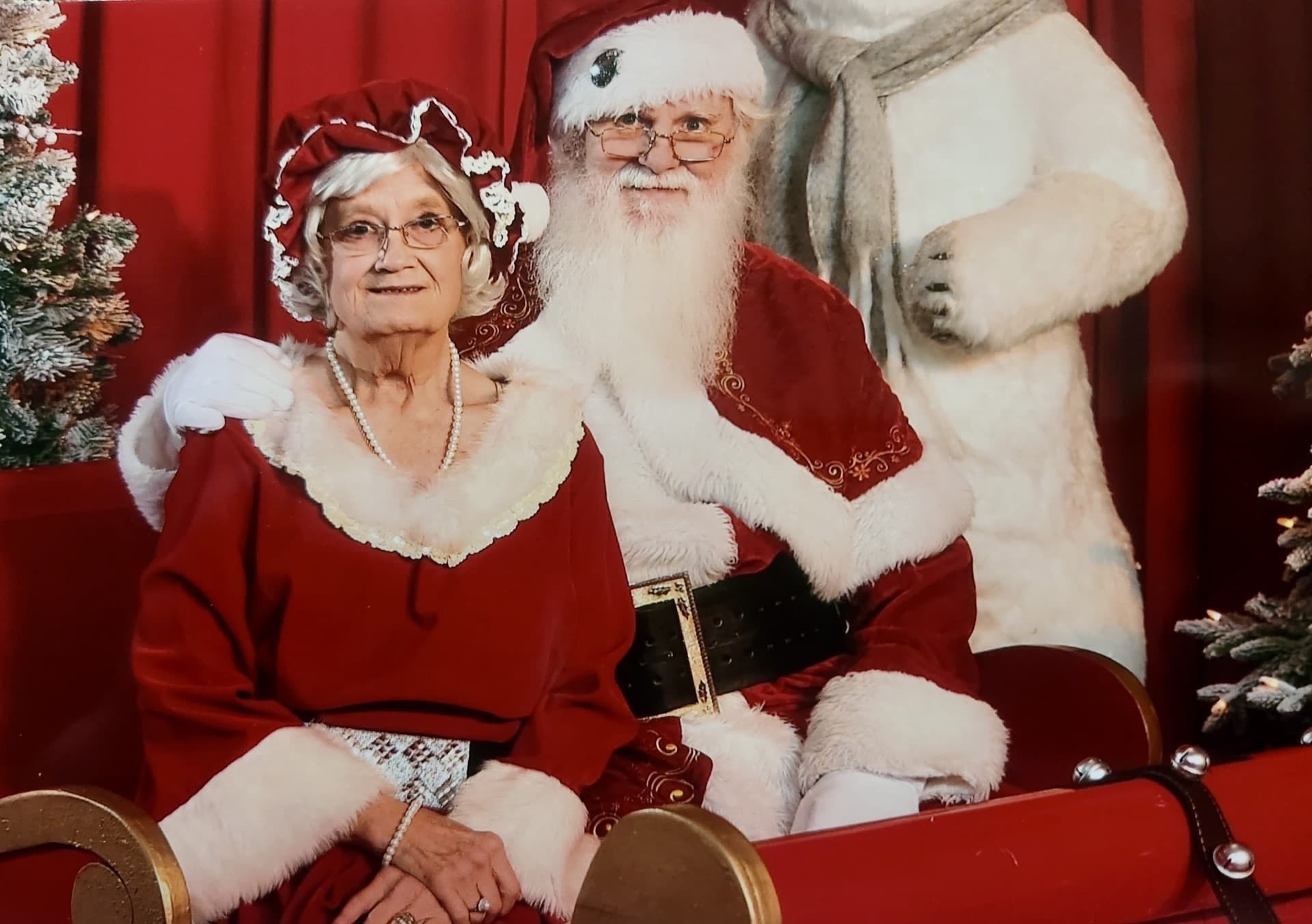 Mrs Claus and Santa portrait at indoor holiday meet-and-greet