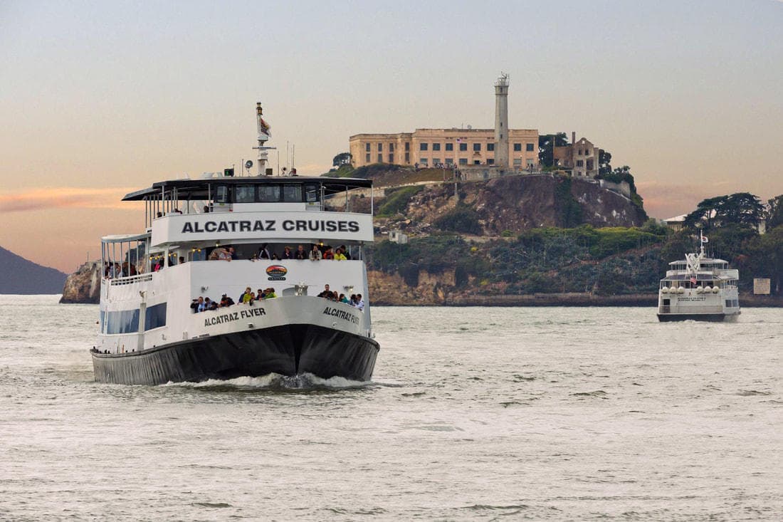 Alcatraz cruise ferry approaching island in San Francisco Bay tour