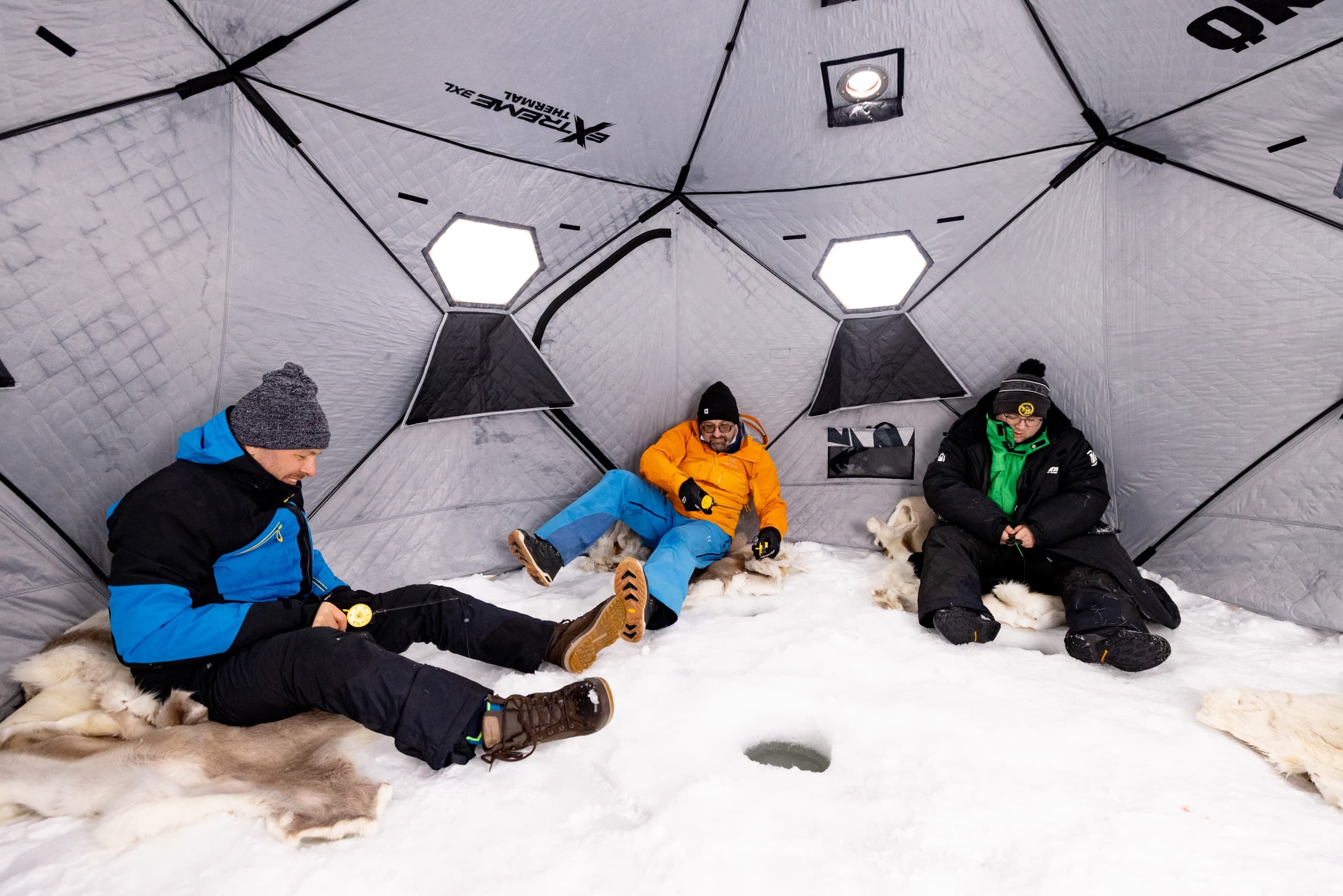Ice Fishing & Drysuit Float in Pelkosenniemi: Arctic Winter Experience photo 3