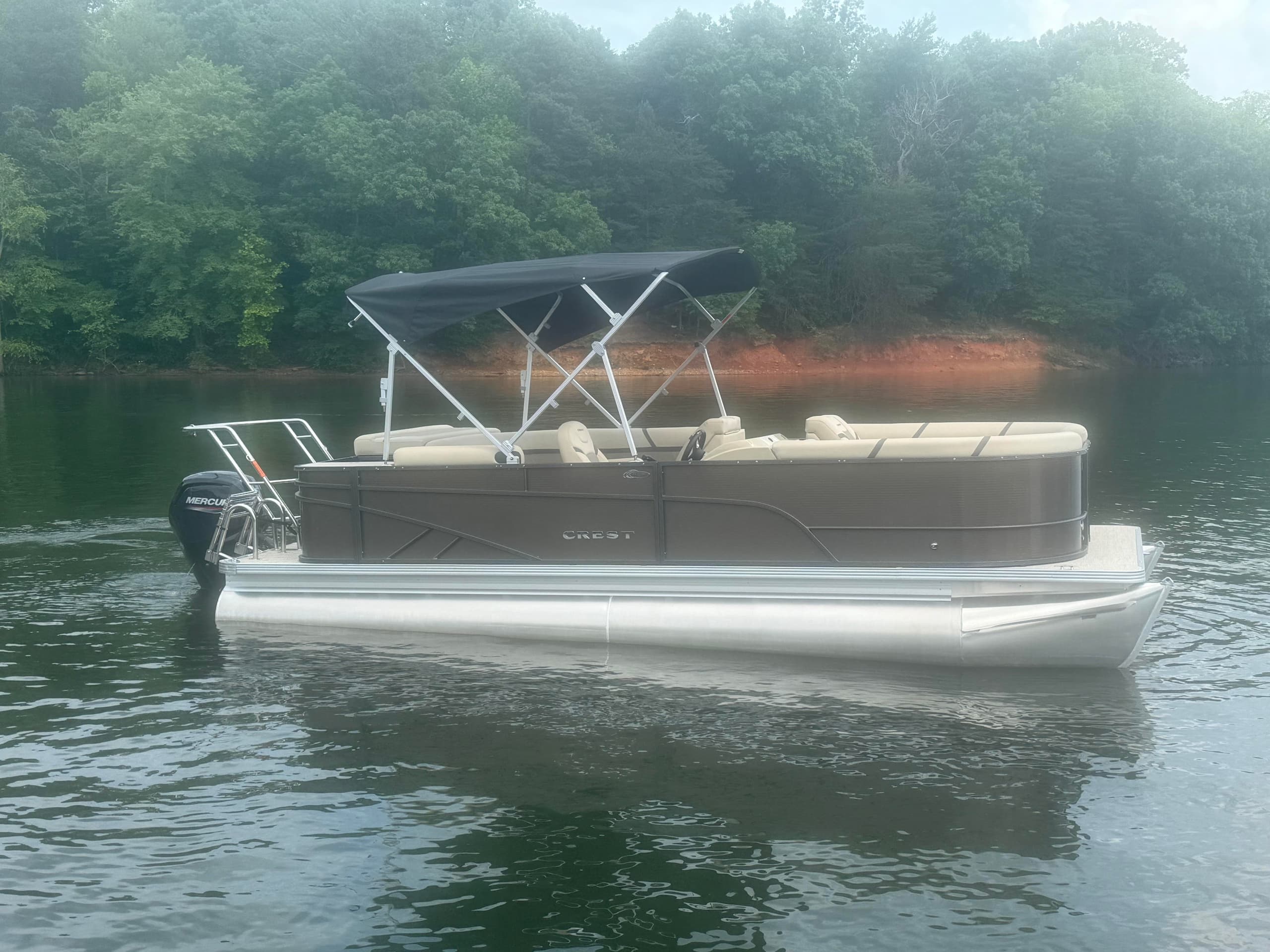Explore Lake Hickory with the Penny 22' Dark Brown Crest Boat Rental