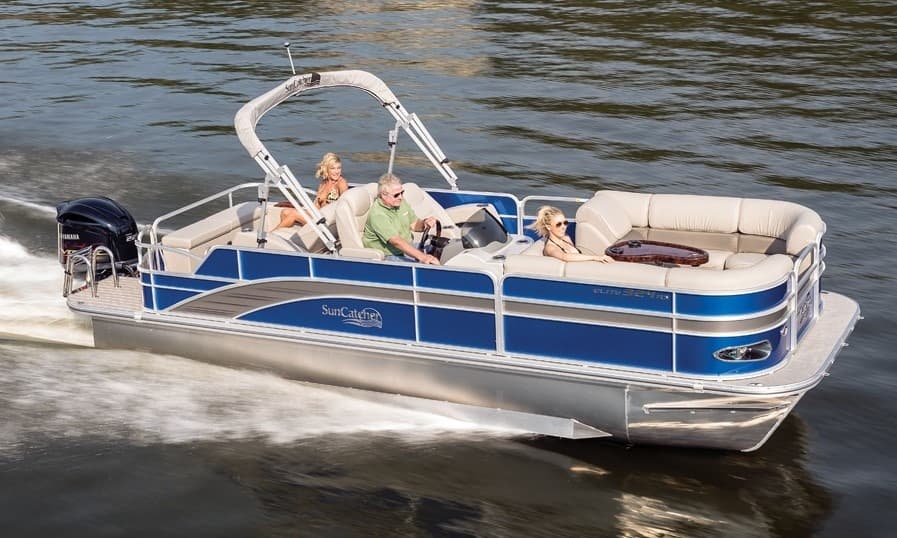 Family pontoon cruising river with lounge seating, summer outing