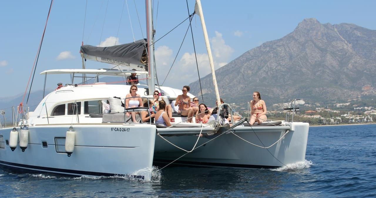 Explore Marbella’s Coastline on a Group Catamaran Adventure with Snorkeling and Fishing