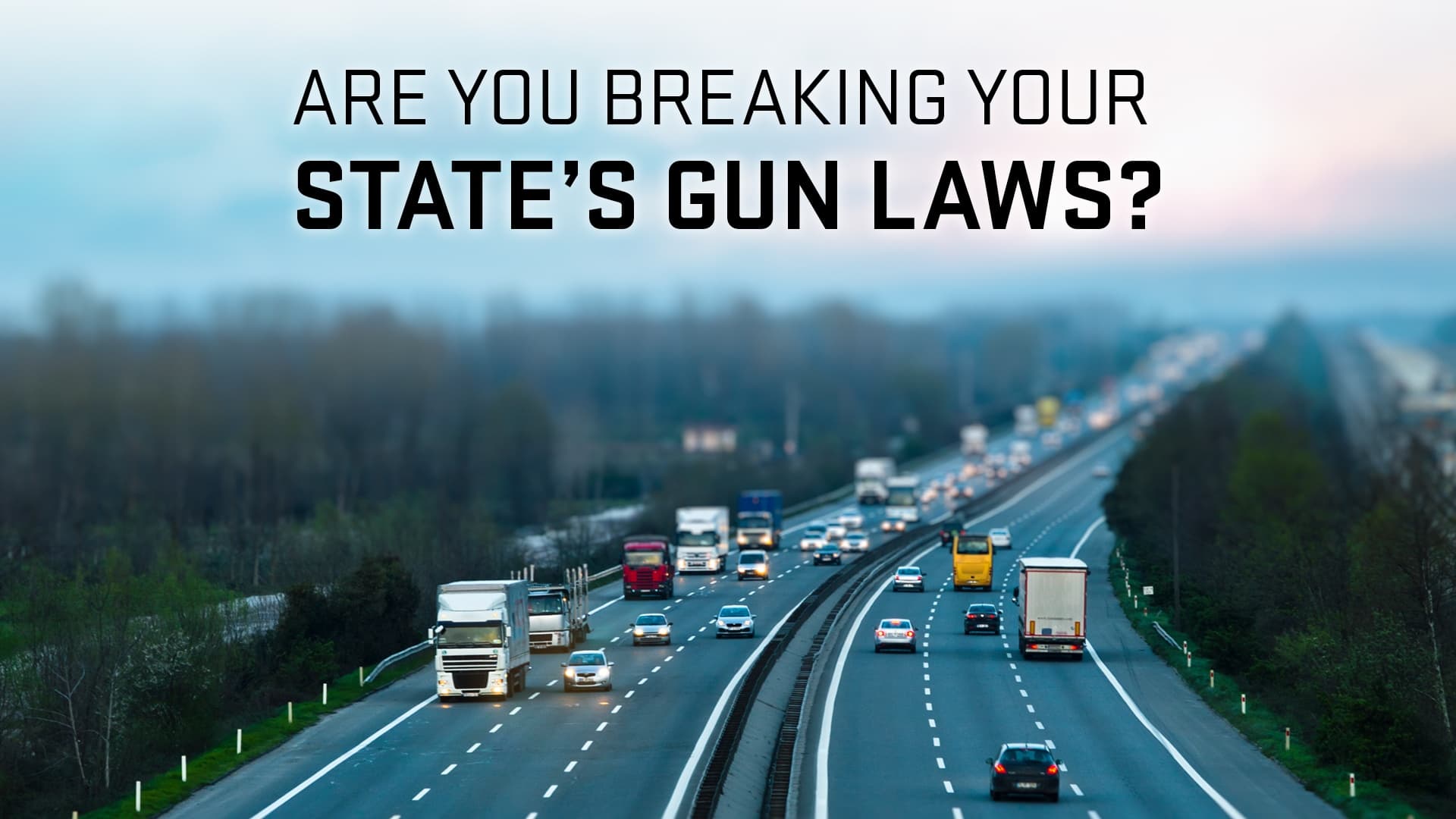 Highway aerial with traffic and advisory about gun laws