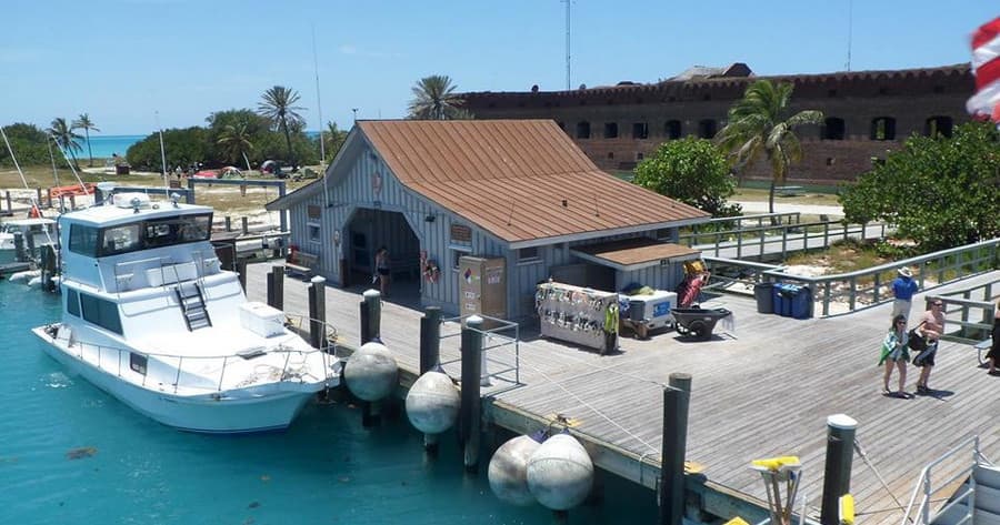 Marina with charter boats and tropical dock in Key West