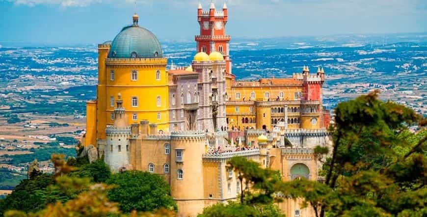 Colorful Pena Palace panoramic view, hilltop palace sightseeing