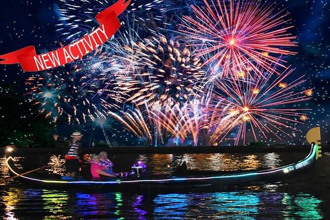 Night fireworks boat tour over coastal waters with lit gondola