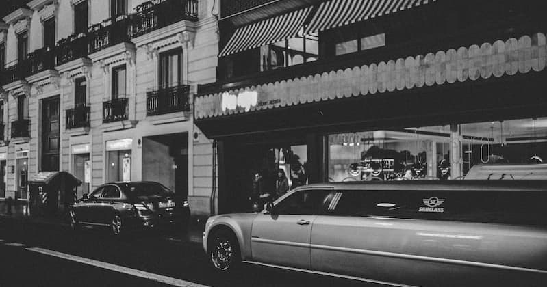 Black and white vintage Las Vegas street scene at dusk