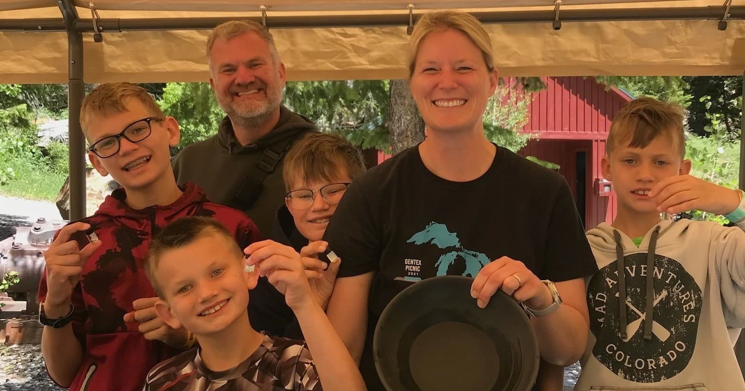 Family gold panning and outdoor mining demo near Georgetown