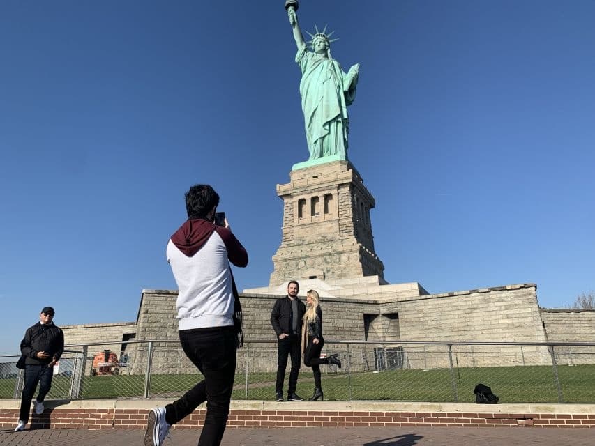NYC 9/11 Memorial & Statue of Liberty Tour by Universal Tour Guide US