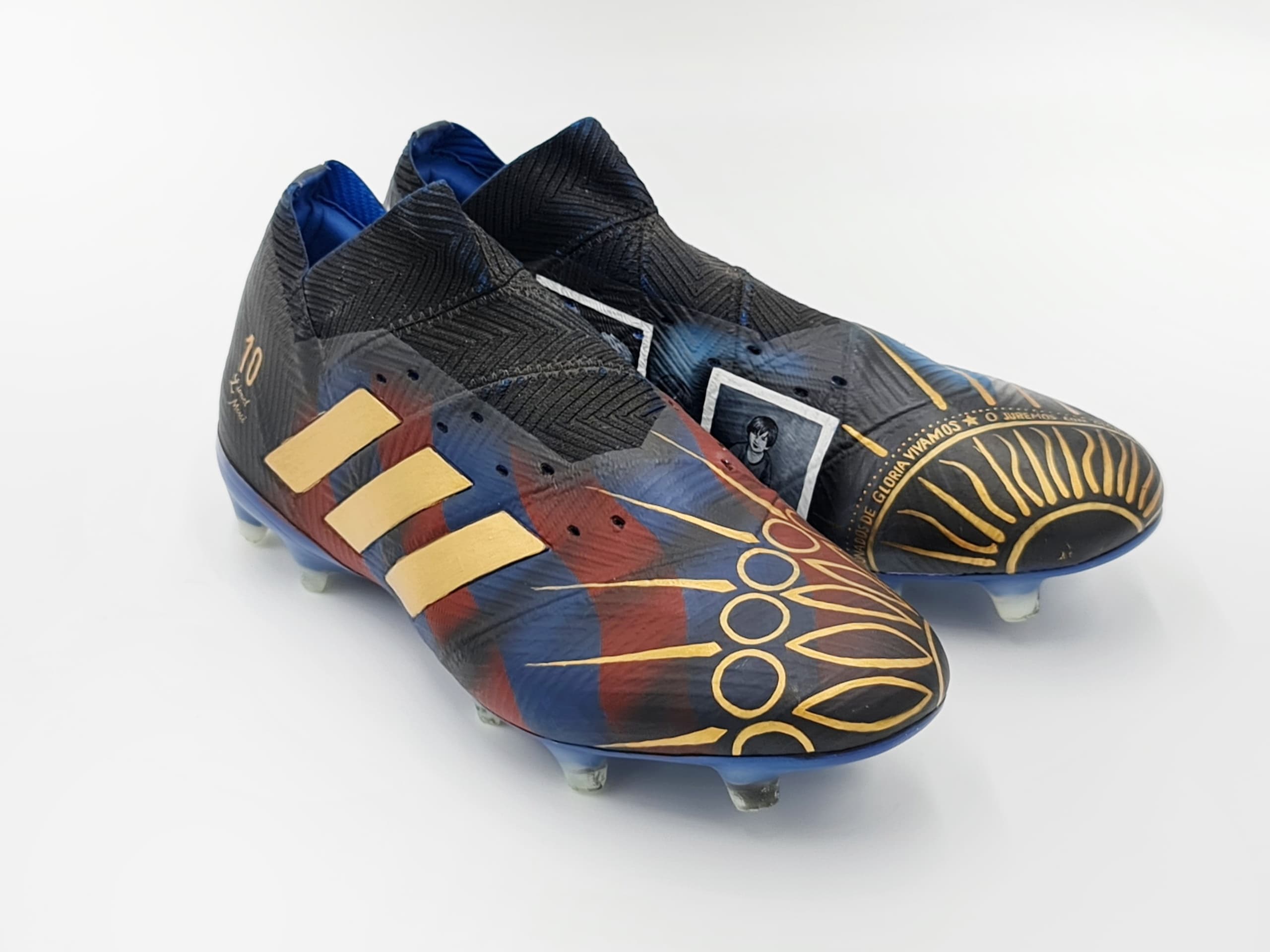 Decorative soccer cleats showcased on studio white background for pitch use