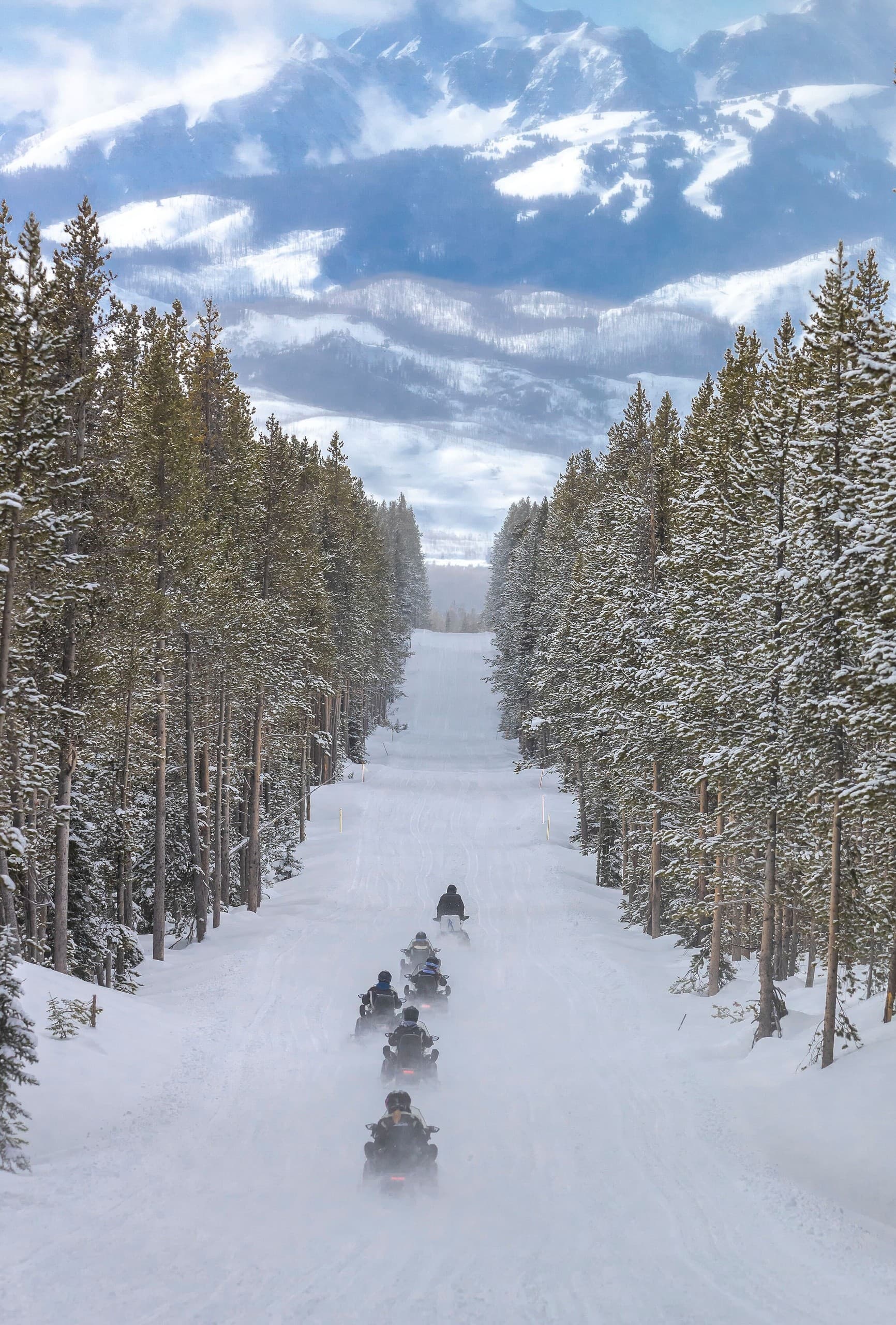 Snowmobile Tour to Old Faithful: Winter Geyser Safaris from Jackson